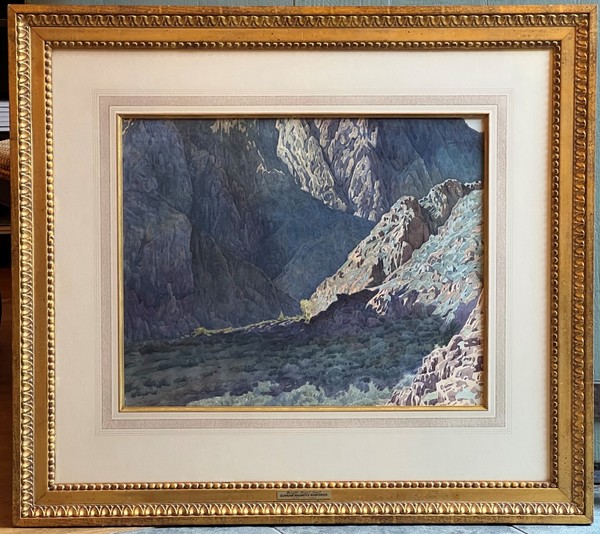 Gunnar Widforss - "Bright Angel Trail" Gunnar Widforss - "Bright Angel Trail" - Watercolor - 16" x 20" - Notarized estate provenance on reverse
<br>With title plaque
<br>
<br>This work is recorded and illustrated in the online catalogue raisonné of Gunnar Widforss’ work by Alan Petersen as catalogue entry #420. The online catalogue raisonné is available at www.gunnarwidforss.com.
<br>
<br>"Although it isn't one of his "classic" Canyon paintings it is a great document of his practice of hiking in the Canyon to paint in remote locations." (excerpted from email from Alan Petersen/05/04/2022).
<br>
<br>"Gunnar painted it near the mouth of Bright Angel Canyon, about a mile from Phantom Ranch, near the Colorado River, looking downstream. He probably would have been near the trail, but not really on it. In the painting, the river is hidden by the diagonal slope that cuts across the view from the right (north). The Bright Angel Trail itself is just out of the view to the right, further downstream."
<br>
<br>"Since the painting has been known by that title (Bright Angel Trail) for some time, I think I'd stick with it. It maybe isn't the most accurate, geographically, but it's also not inaccurate. I'm going to change the title in the catalogue. (Grand Canyon: Inner Canyon).
<br>
<br>(excerpted from email from Alan Petersen/06/03/2022).